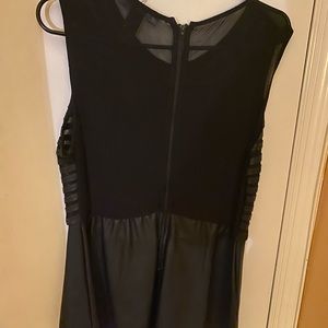 Black faux leather and sheet top